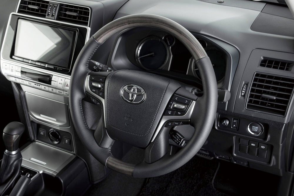 67 ROKU NANAウッドコンビステアリング　150プラド（ブラックウッド）